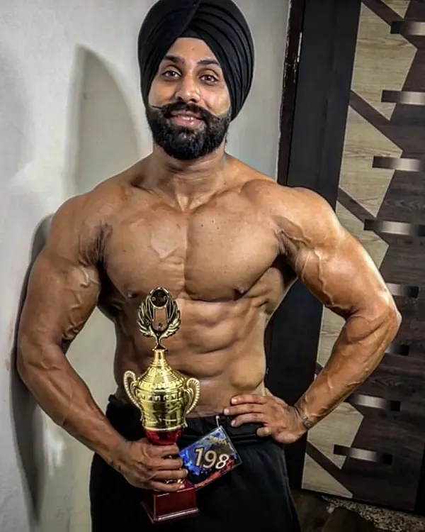 This is the result of discipline. Holding a trophy is a feeling that no amount of Instagram likes can replace. My goal is to get you stage-ready, not just gym-ready, with a physique that shows true dedication and hard work.