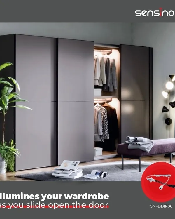 Our smart sensor solutions extend to your wardrobe. This image shows how a Sensinova door sensor automatically illuminates your closet as you slide open the door, making it easy to find what you need.