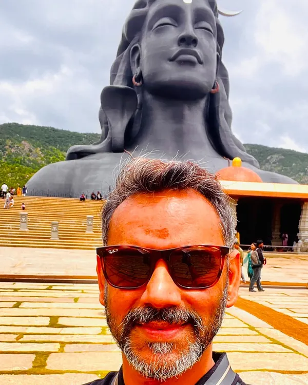 My spiritual practice is a source of immense strength and grounding. This selfie at the Adiyogi statue in Bengaluru represents a moment of gratitude and devotion, connecting my daily work as a coach with a deeper, inner journey.
