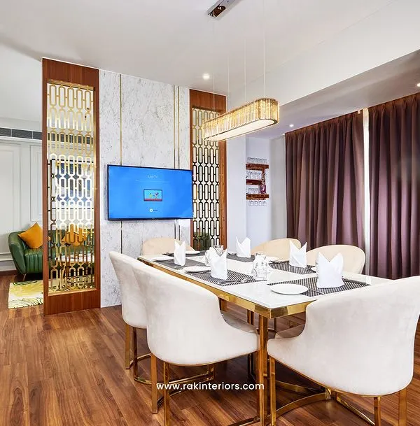 This suite at the Hotel Travancore Court in Ernakulam shows how I blend luxury with functionality. The design focuses on creating a high-end experience for business travelers, with distinct zones for dining and relaxation, custom lighting, and premium finishes.