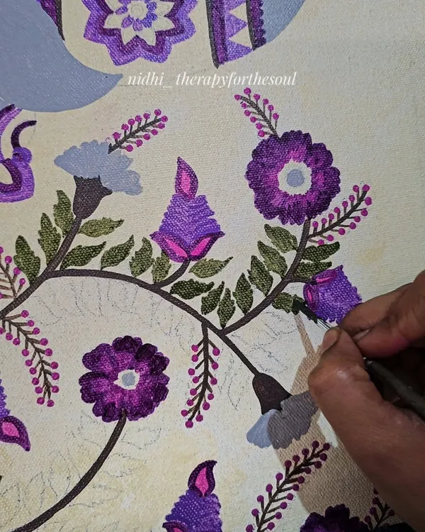 A close-up, work-in-progress shot of a Kalamkari-style painting. This shows the careful, hands-on process of building up layers of color and detail with a fine brush, which is the soul of all my handmade art.