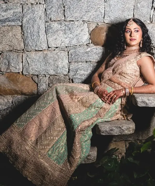 A stunning, artistic shot of a bride from her pre-wedding photoshoot. The makeup was designed to look beautiful in both natural and dramatic lighting.