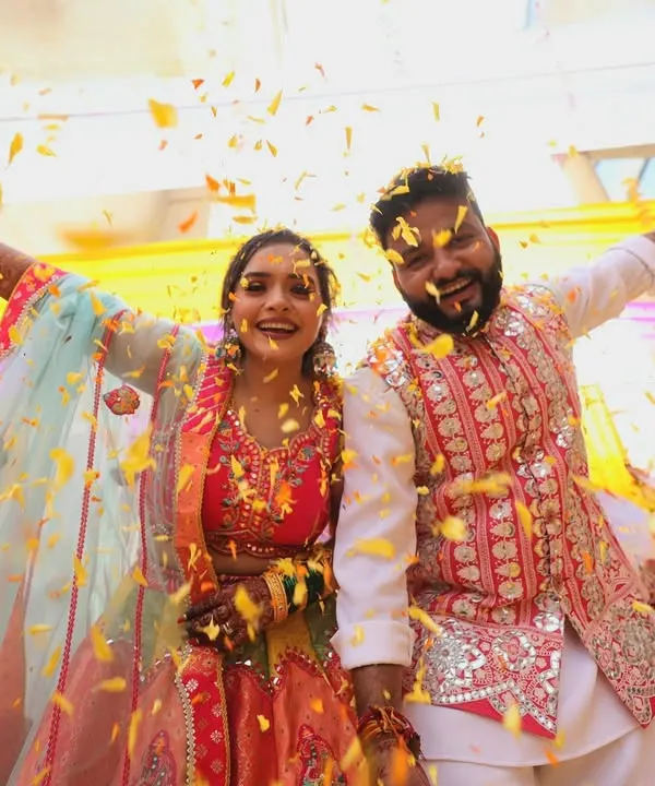 A Phoolon ki Holi is the most joyful way to celebrate Haldi. We love organizing these moments where the couple is showered with love and flower petals.