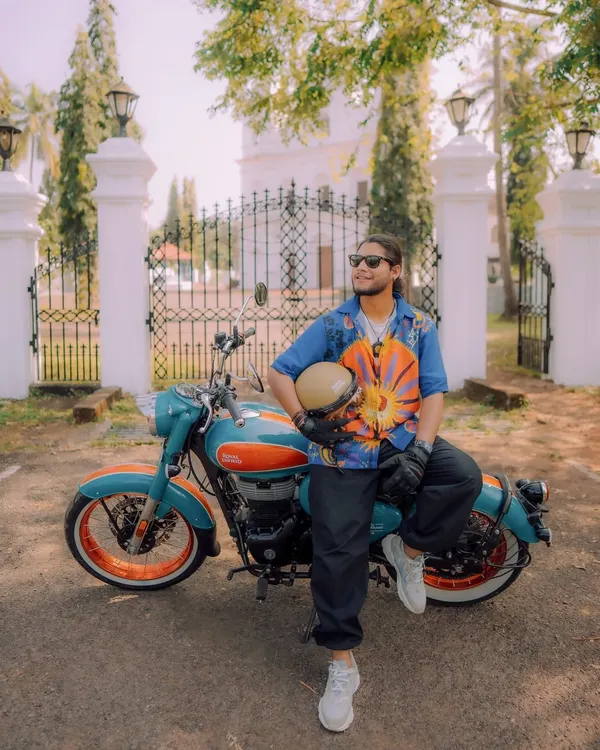 Here I am with the new Royal Enfield Goan Classic 350. This shot was designed to highlight the bike's classic charm against a backdrop of Goan architecture, creating a vibrant, aspirational lifestyle image.