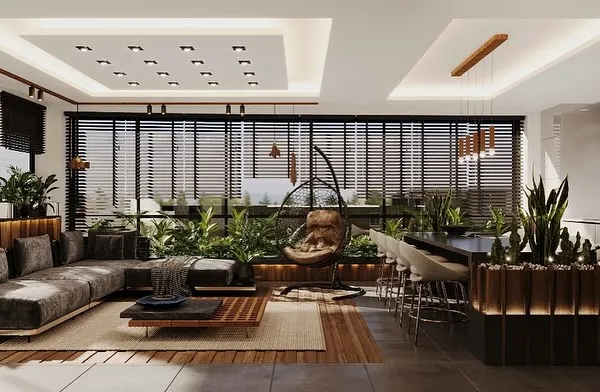 A complete view of a terrace sunroom project, integrating a lounge area, dining space, and kitchen. We used long planters filled with tall faux grasses to create a green border and enhance the connection to the outdoors.