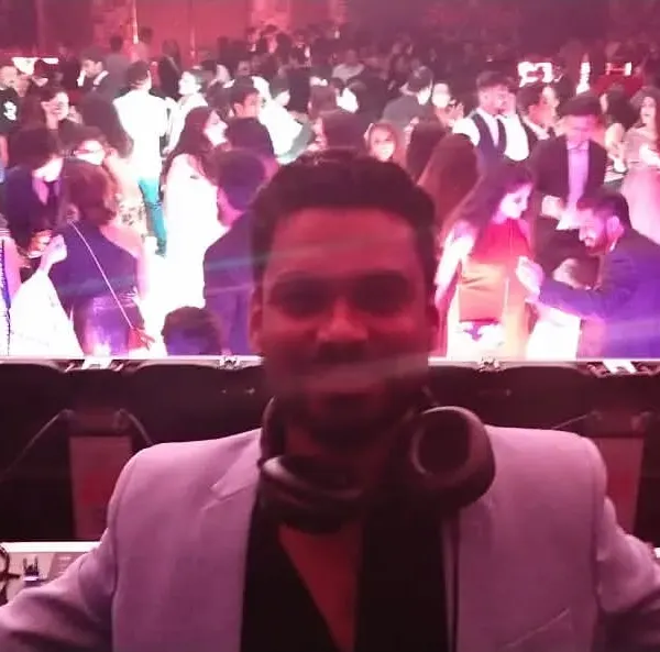 This is my view from the DJ booth. I thrive on the energy of a packed dance floor and love connecting with the crowd to keep the party going all night long.