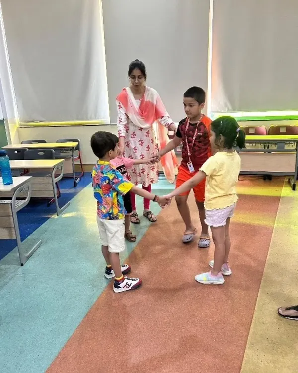 Our dramatics club uses interactive games to teach expression, teamwork, and confidence. Here, students participate in a group activity designed to build non-verbal communication skills and stage presence in a playful environment.