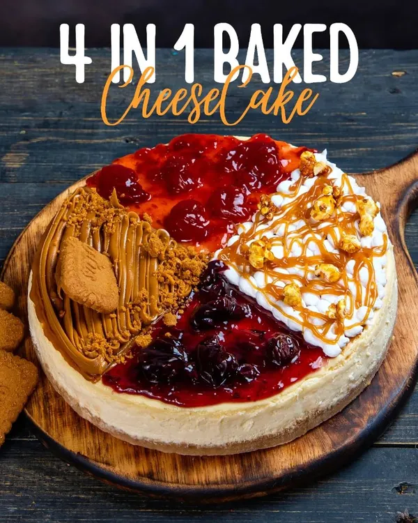 Our 4-in-1 Baked Cheesecake is the ultimate treat for the indecisive dessert lover. It features sections of Lotus Biscoff, Blueberry, Salted Caramel, and Strawberry on one creamy cheesecake base.