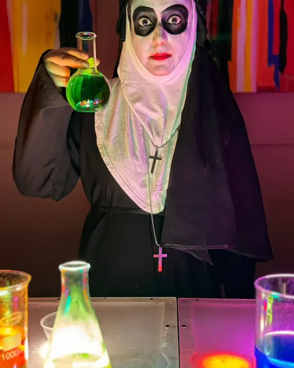 Our hands-on workshops are a huge hit. Here, our expert from Science-O-Mania leads a 'Mad Scientist' session, letting kids mix their own glowing, bubbling potions in a safe and super fun environment.