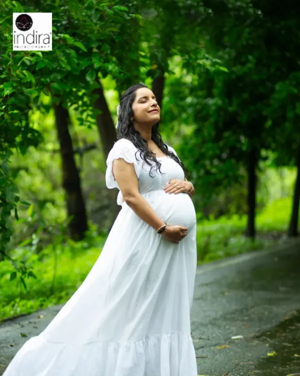 A serene moment for a mother-to-be, surrounded by the calm of nature. I love using natural light to capture that special pregnancy glow in outdoor maternity sessions.