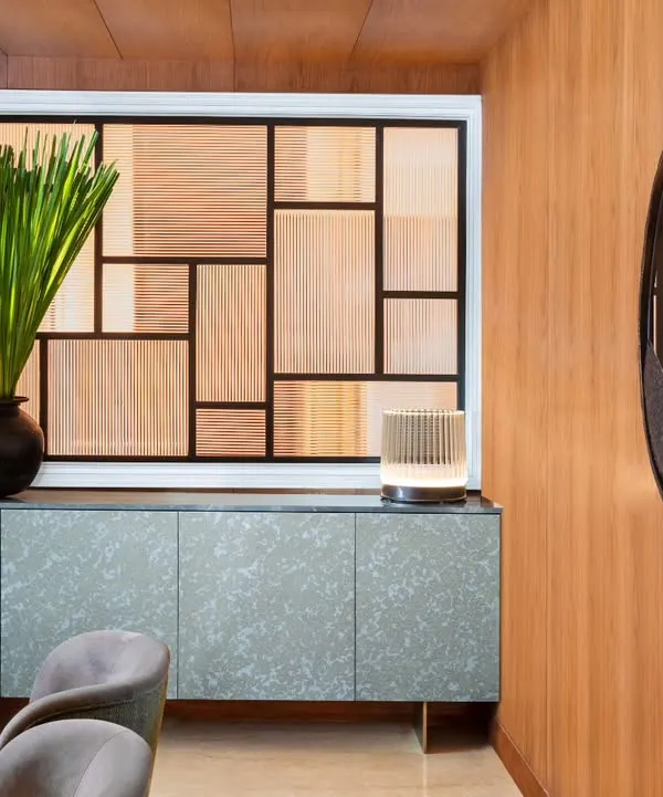 A detail of the Magnolia dining room, showcasing a standout sideboard with unique texture and colour. The space is a curated collection of exceptional design, where every piece is chosen with purpose to create a visually compelling dining experience.