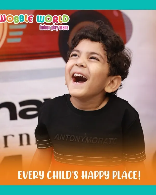 This picture of pure, uninhibited laughter says it all. We are proud to be every child's happy place.