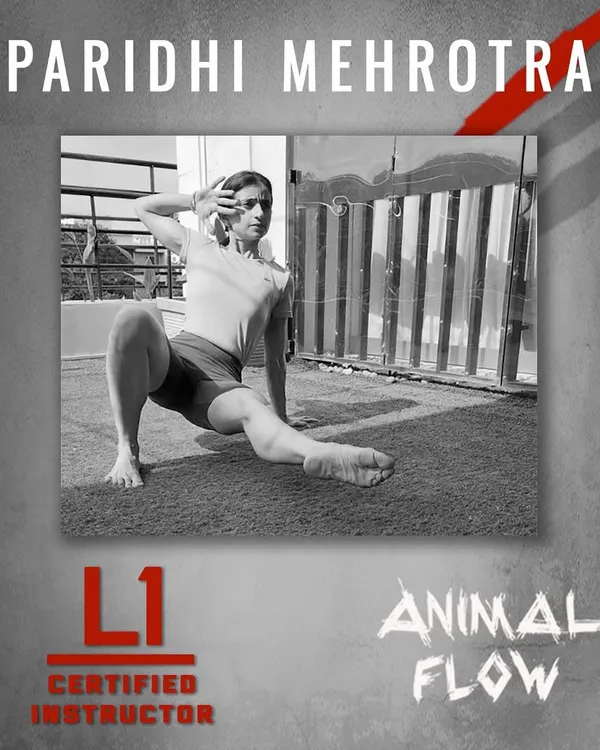 I am a certified Level 1 Animal Flow instructor. This image captures the essence of the practice: a powerful, ground-based movement that builds strength, flexibility, and body control.