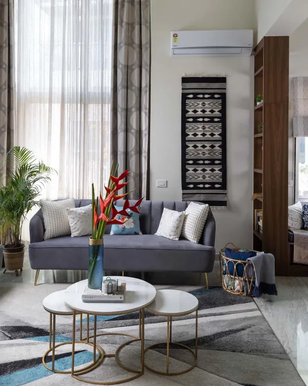 This living room from the Lakshya project blends contemporary lines with the relaxed warmth of California casual style. The neutral palette, soft textures, and abundant natural light create an airy and sophisticated space.