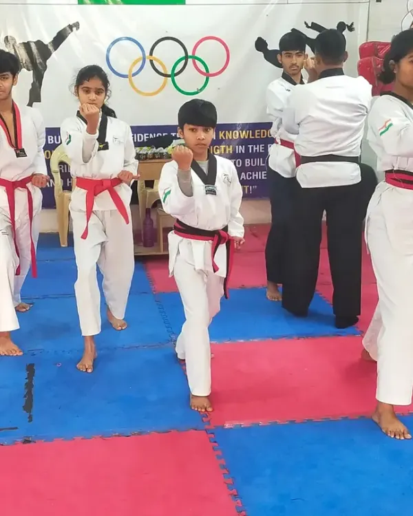 Our students practicing their Poomsae in unison during a black belt test. This demonstrates their synchronization and deep understanding of the forms.