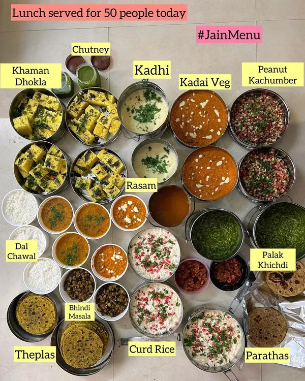 A beautiful, abundant lunch spread I prepared for a gathering of 50 people. This all-Jain menu featured a variety of dishes like Kadai Veg, Palak Khichdi, Khaman Dhokla, and more, ensuring there was something for everyone to enjoy.