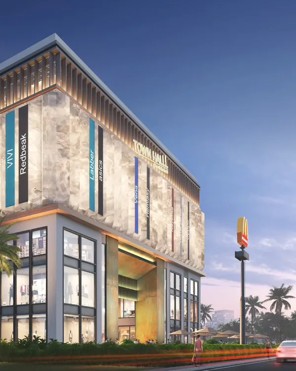The Town Hall in Siliguri is designed as a landmark for the city's skyline. This exterior view shows the G+5 structure, which integrates vibrant retail, cinemas, restaurants, and office spaces into a single, cohesive destination.