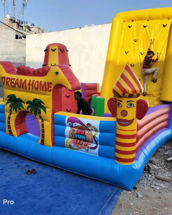 Our 20x20 foot combo bouncy castle includes a large jumping area, multiple obstacles, and a tall inflatable climbing wall. It's a complete activity center for kids.