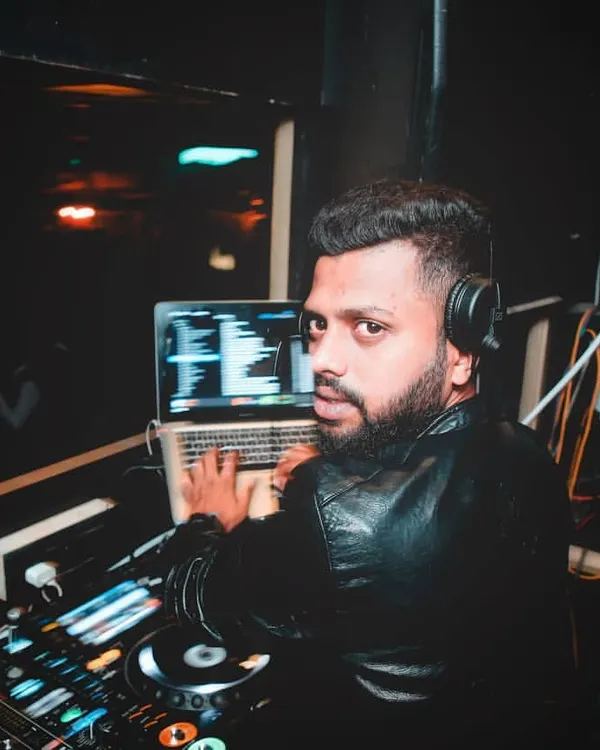 This is my second home: the DJ booth at Opa Bar and Cafe. As the head resident DJ, I'm here every weekend, shaping the venue's sound and making sure every Friday night is a massive one for the Mumbai nightlife scene.