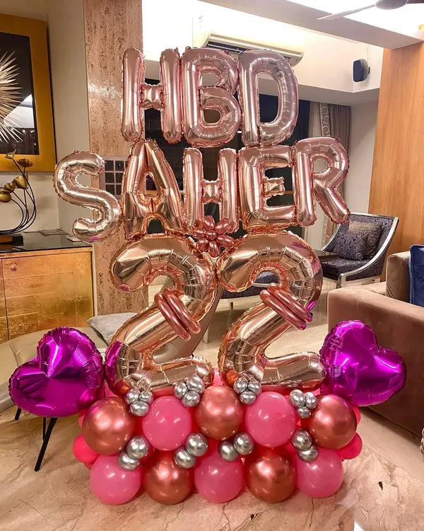 A fun and girly birthday balloon bouquet for a 22nd birthday. I used a mix of rose-gold, pink, and silver balloons to create this large, deliverable arrangement.