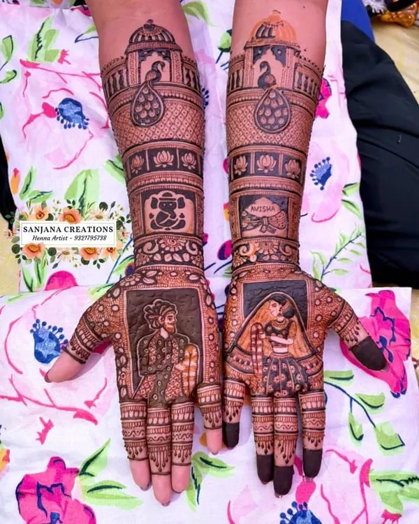 This full bridal mehndi is a masterpiece of storytelling, featuring custom portraits of the bride and groom, a Ganesha motif for blessings, and intricate patterns inspired by royal Indian architecture.