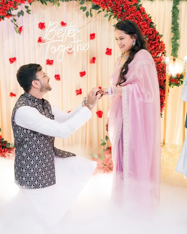 A classic ring exchange moment, made even more special with the dreamy, low-lying fog effect and romantic floral backdrop. We focus on capturing the core memories of your engagement ceremony.