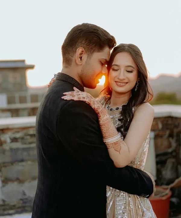 A quiet moment for the couple against a stunning sunset backdrop in Udaipur. I live for capturing these golden hour portraits that feel like they are straight out of a movie.