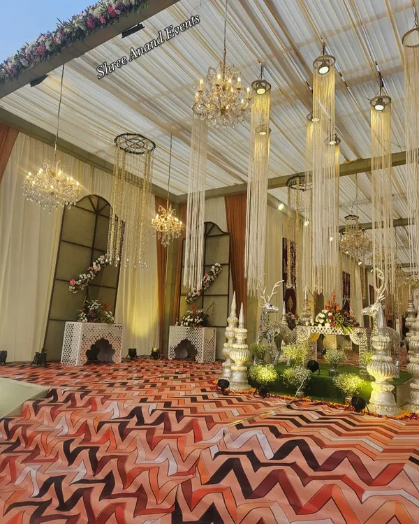 A look at the intricate details of our decor, from hanging chandeliers to floral arrangements, before the guests arrive.