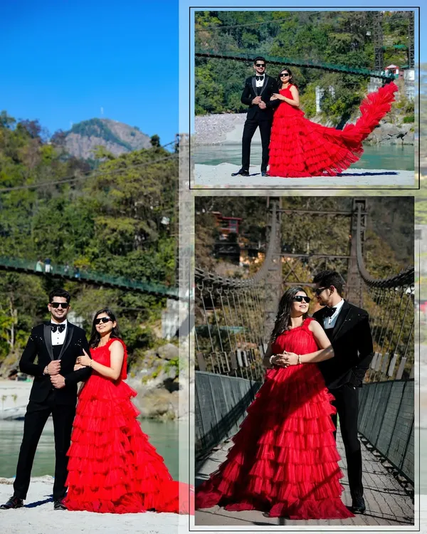 A stunning shot on a suspension bridge in Rishikesh. The bride's vibrant red gown creates a breathtaking contrast against the lush green mountains and blue sky, making for a truly cinematic image.
