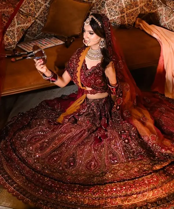 A breathtaking wide shot that captures the full splendor of a bridal lehenga. My goal here was to create a sense of grandeur and make the outfit the hero of the story, perfect for a brand's main campaign image.
