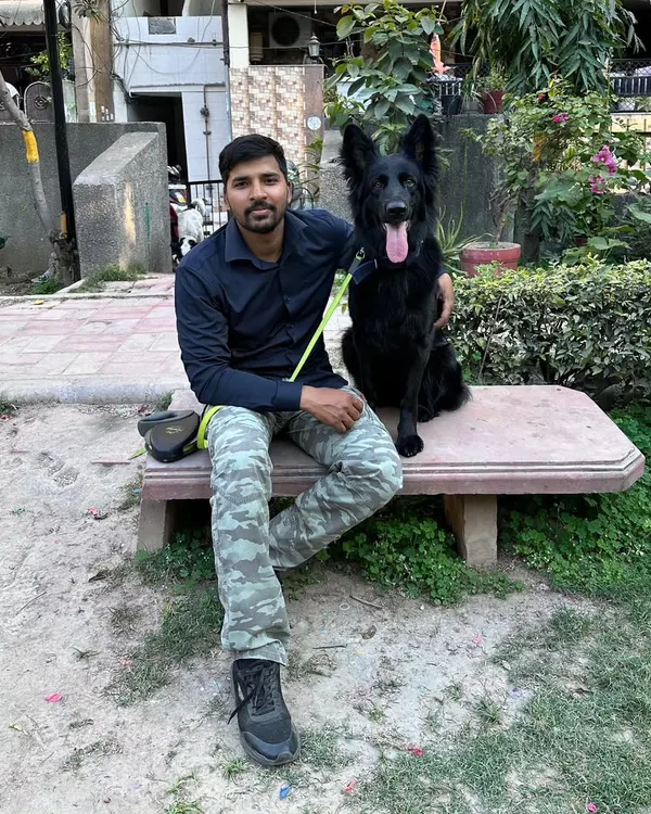 With my partner in adventure, Lucy the black German Shepherd. Every dog I work with becomes a part of my journey.