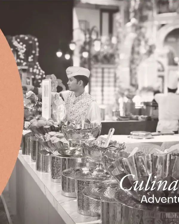 A culinary adventure awaits. Through our collaboration with The Chaat Story, we offer the perfect blend of spicy chaats and savory tandoori delights, as seen in this bustling live chaat counter setup.