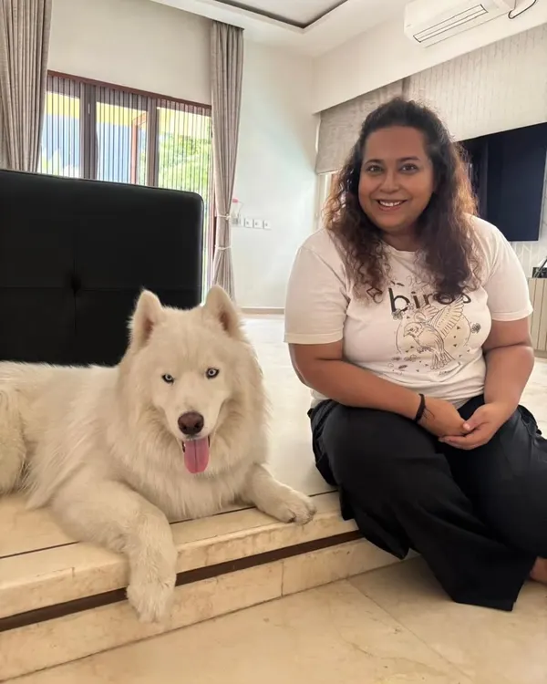 This is me with Romeo, a handsome husky who graduated from our behavior modification program. We worked through some tough, deep-rooted triggers to help him find his calm.