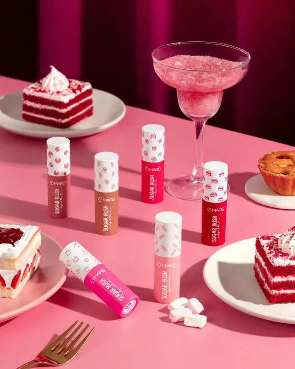 A playful and indulgent scene for Mars Cosmetics' "Sugar Rush" line. We surrounded the products with cakes and sweets on a monochrome pink set to create a delicious and vibrant aesthetic that perfectly matches the brand name.