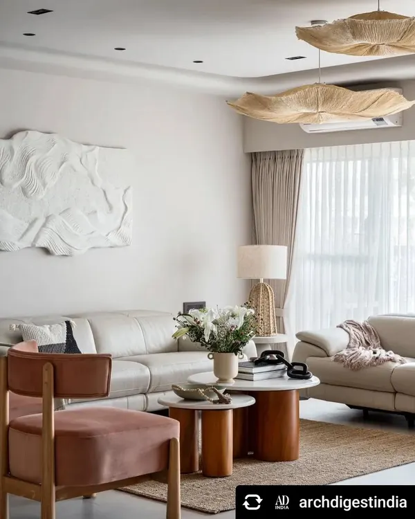 A snapshot of the living room from our Architectural Digest feature. The design combines natural textures like jute and wood with soft, comfortable furniture to create a relaxed yet sophisticated vibe.