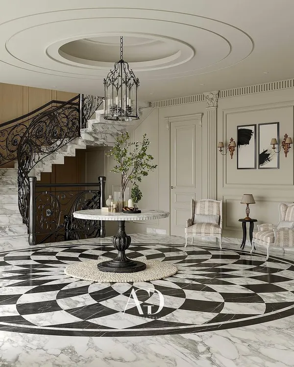 This lobby is designed as a portal of first impressions, blending antiquity with modernity. The striking black and white marble floor inlay and ornate wrought iron staircase create a narrative of French classical aesthetics, ensuring functionality is wrapped in timeless beauty.