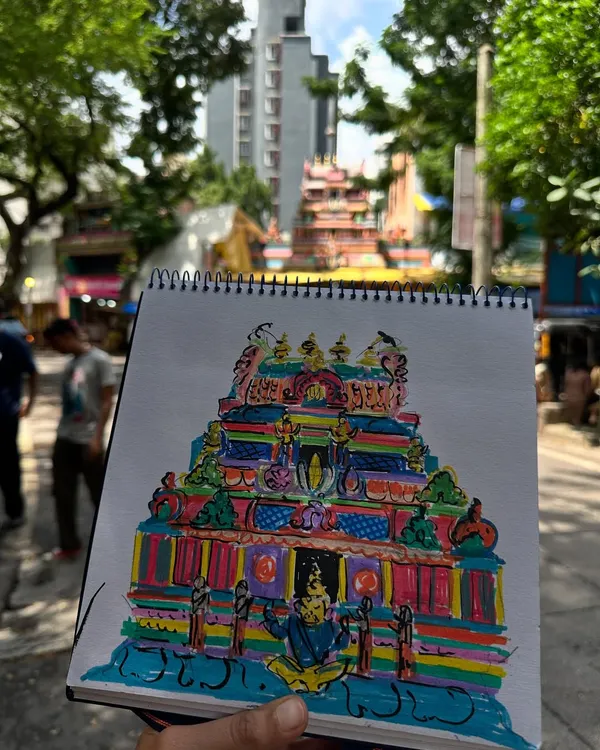 My vibrant sketch of the Ahobilam temple in Chembur, held up against the real thing. I used bold colors to capture the energy of this beautiful place during a sketch walk with USK Mumbai.