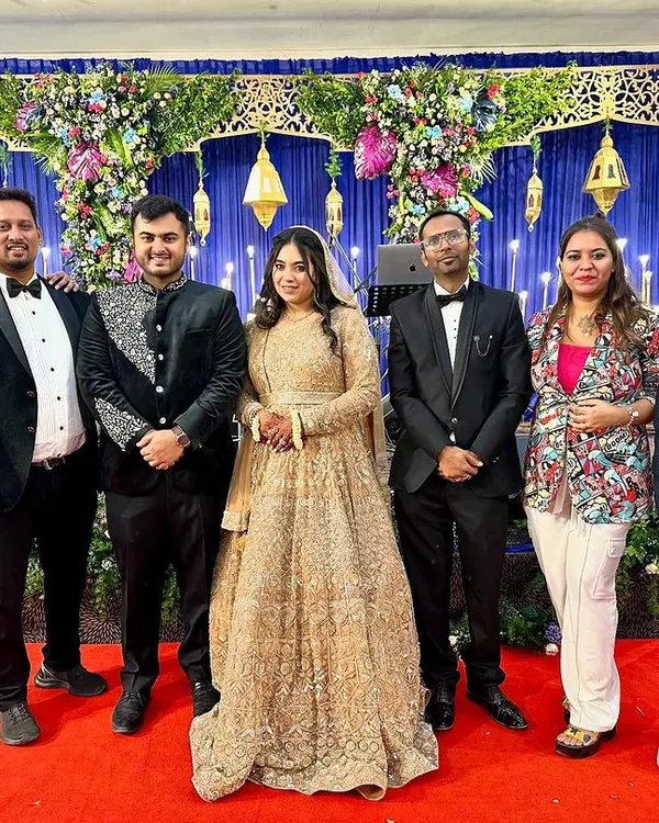 It was an honor to perform for this wonderful couple on their special day. Posing with the newlyweds after a night filled with dance, music, and joy. We wish them a lifetime of happiness.