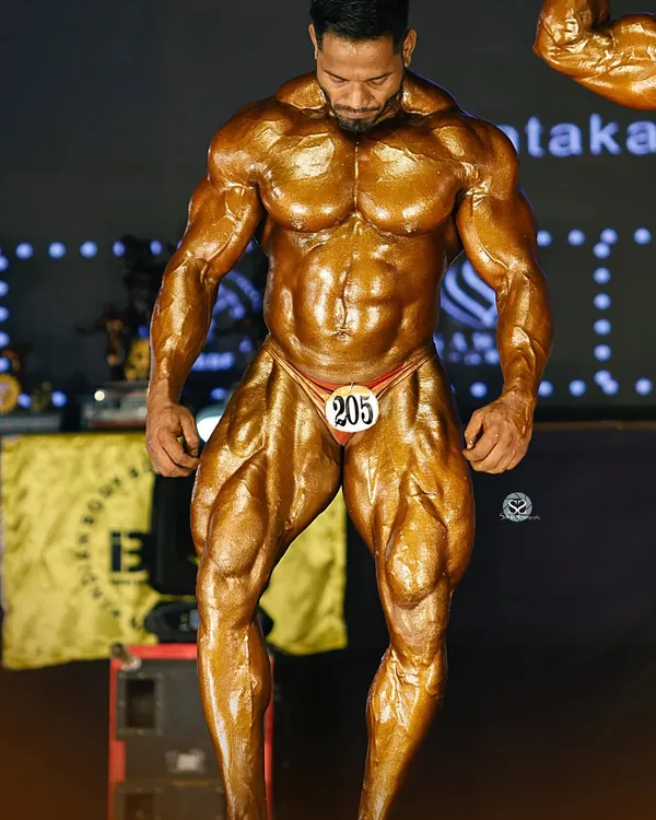 This is what we work for: peak conditioning on the Mr. India stage. Every muscle detailed, every line sharpened. This is the result of a brutal diet, relentless training, and perfect peak week execution.