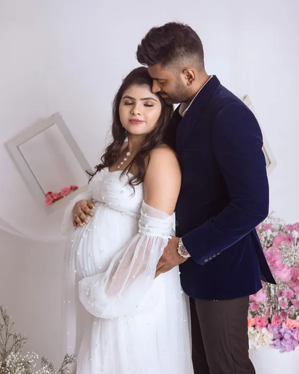 A quiet, tender moment between the parents-to-be. We love capturing these gentle embraces during our couple maternity shoots.