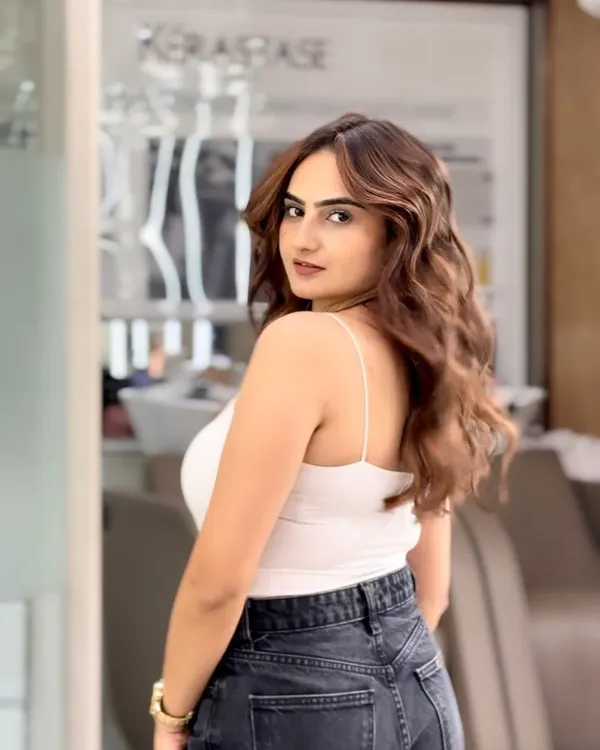 A beautiful final look showing a rich caramel balayage. The soft waves really show off the dimension and the seamless blend of colors I created.