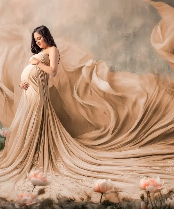 This is what a dream setup looks like. For this fine art maternity portrait, I used flowing fabrics and a digitally enhanced floral landscape to create a truly magical, painting-like memory for this mommy-to-be.