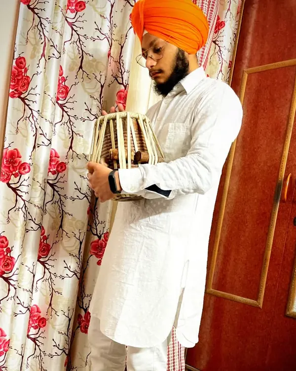 A moment of connection with my bayan, the larger of the two tabla drums. It is responsible for the deep, resonant bass sounds.