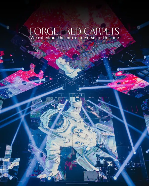 We rolled out the entire universe for this 'Infinity and Beyond' party. The massive astronaut projection over the stage was the centerpiece of a completely immersive celestial experience.
