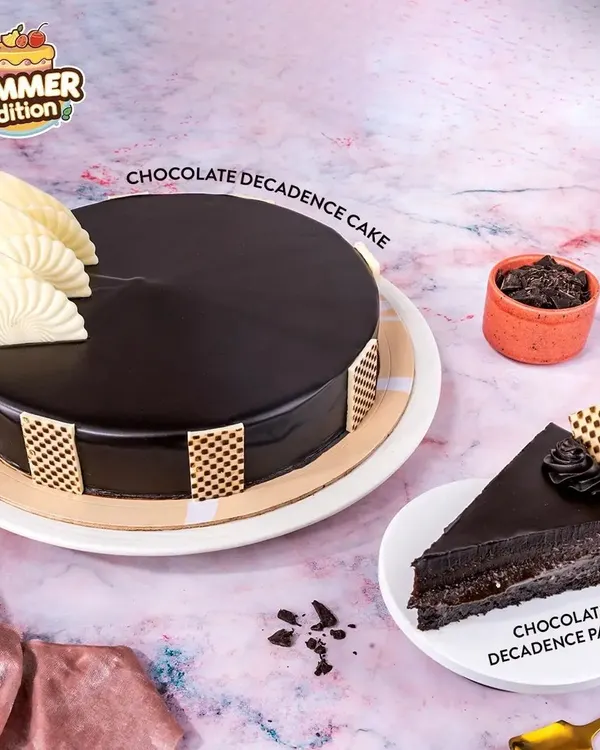 Our Chocolate Decadence cake is pure bliss for any chocolate lover. With its glossy finish and rich, deep flavor, this is the perfect centerpiece for your most special celebrations.