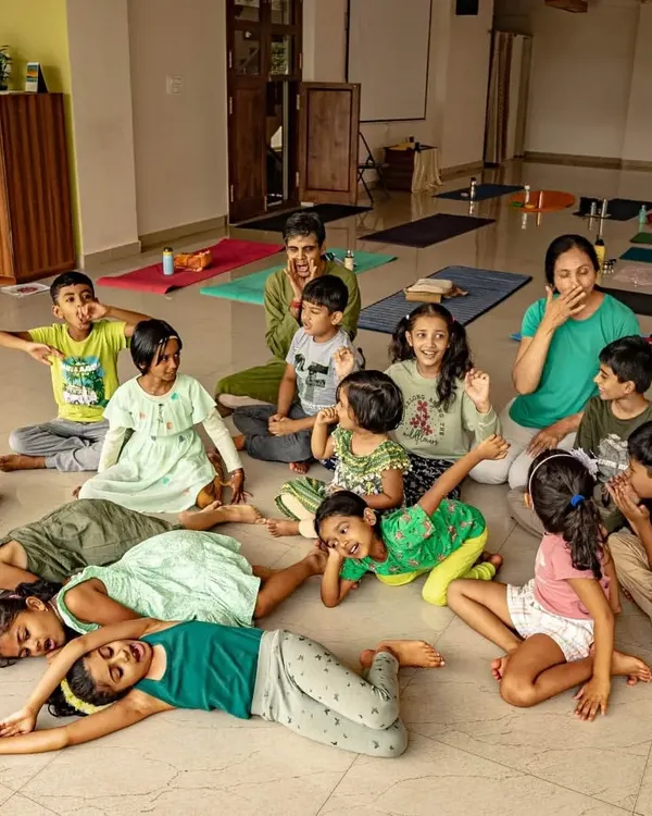 This image captures the pure, unfiltered joy that is at the heart of my classes. It’s not about perfect poses, but about finding happiness and ease in our bodies. This is the kind of shanti, or peace, that we cultivate together.