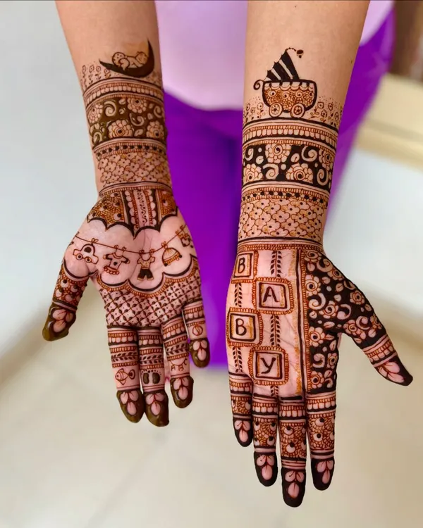 A full view of the custom baby shower mehendi for Akansha. The design is filled with personal touches and celebratory motifs perfect for welcoming a new baby.