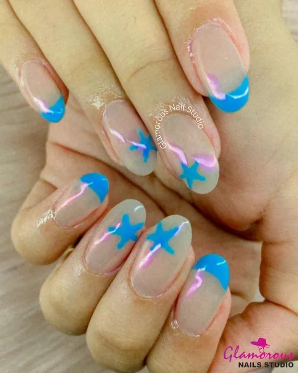 A playful take on a classic. This design features a clean, natural base with bright sky-blue French tips and matching star accents for a fun and youthful vibe.