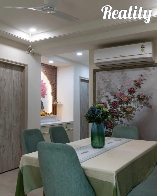 The finished dining area, showing the reality of the design with its floral artwork and sage green chairs, perfectly matching the render.