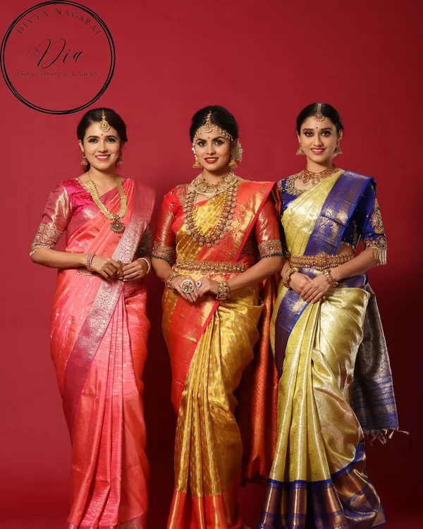 A beautiful photoshoot showcasing traditional bridal elegance. I created three distinct but complementary South Indian bridal looks, each featuring a different Kanjeevaram saree, hairstyle, and jewellery set.